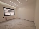 Ground floor apartment with a garden for sale in Dahiet Al Amir Rashid