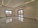 Ground floor apartment with a garden for sale in Dahiet Al Amir Rashid