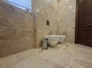 Attached villa with pool for sale in Abdoun, a building area of 745m