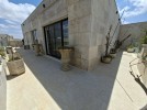 Attached villa with pool for sale in Abdoun, a building area of 745m