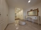 Attached villa with pool for sale in Abdoun, a building area of 745m