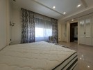 Attached villa with pool for sale in Abdoun, a building area of 745m