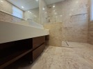 Attached villa with pool for sale in Abdoun, a building area of 745m