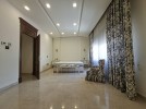 Attached villa with pool for sale in Abdoun, a building area of 745m