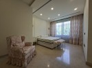 Attached villa with pool for sale in Abdoun, a building area of 745m