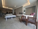 Standalone villa with pool for sale in Al Hummar an area of 1200m
