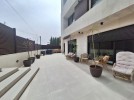 Duplex apartment with a garden for sale in Abdoun 250m