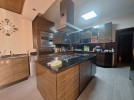 Duplex ground floor apartment with a garden for sale in Al-Kursi 400m