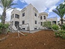Independent villa with a high view Suitable for three families for sale in Al-Dumaina