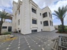 Independent villa with a high view Suitable for three families for sale in Al-Dumaina