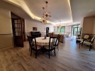 Ground floor apartment with terrace for sale in Umm Uthaina 310m