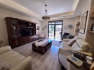 Ground floor apartment with terrace for sale in Umm Uthaina 310m