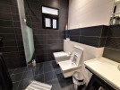 Ground floor apartment with terrace for sale in Umm Uthaina 310m