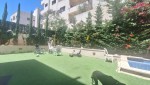 Ground floor apartment with a garden for sale in Umm Al Summaq