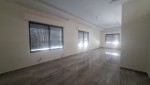 Ground floor apartment with a garden for sale in Umm Al Summaq