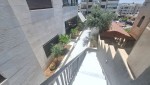 Ground floor apartment with a garden for sale in Umm Al Summaq