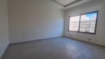 Ground floor apartment with a garden for sale in Umm Al Summaq