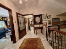 Attached villa for sale in Abdoun with a building area of 1015m
