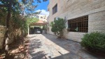 Ground floor apartment with private garage for sale in Khalda