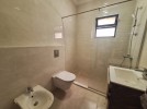 Suspended ground floor apartment for sale in Dair Ghbar