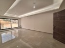 Suspended ground floor apartment for sale in Dair Ghbar