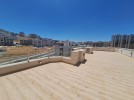 شقة اخير مع روف للبيع في دير غبار بمساحة بناء اجمالية 200م