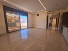 شقة اخير مع روف للبيع في دير غبار بمساحة بناء اجمالية 200م