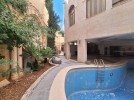 Standalone villa with pool for sale in Dabouq, with a building area of 1800m