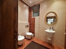 Standalone villa with pool for sale in Dabouq, with a building area of 1800m