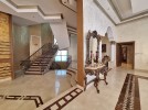 Standalone villa with pool for sale in Dabouq, with a building area of 1800m