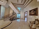 Standalone villa with pool for sale in Dabouq, with a building area of 1800m