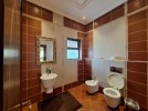 Standalone villa with pool for sale in Dabouq, with a building area of 1800m