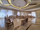 Standalone villa with pool for sale in Dabouq, with a building area of 1800m