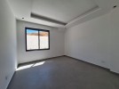 Duplex ground floor apartment with a garden for sale in Abdoun 412m