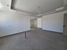 Duplex ground floor apartment with a garden for sale in Abdoun 412m
