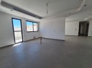 Duplex ground floor apartment with a garden for sale in Abdoun 412m