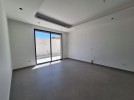 Duplex ground floor apartment with a garden for sale in Abdoun 412m