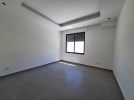 Duplex ground floor apartment with a garden for sale in Abdoun 412m