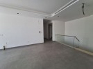 Duplex ground floor apartment with a garden for sale in Abdoun 412m