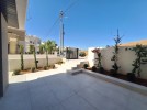 Flat ground floor apartment with a terrace for sale in Abdoun 392m