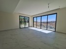 Flat ground floor apartment with a terrace for sale in Abdoun 392m