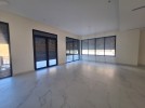 Flat ground floor apartment with a terrace for sale in Abdoun 392m