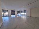 Flat ground floor apartment with a terrace for sale in Abdoun 392m