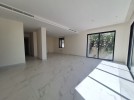 Flat ground floor apartment with a terrace for sale in Abdoun 392m