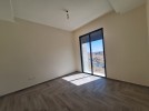 Flat ground floor apartment with a terrace for sale in Abdoun 392m