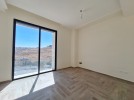 Flat ground floor apartment with a terrace for sale in Abdoun 392m