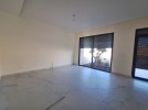 Flat ground floor apartment with a terrace for sale in Abdoun 392m