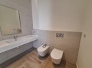 Flat ground floor apartment with a terrace for sale in Abdoun 392m