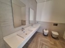 Flat ground floor apartment with a terrace for sale in Abdoun 392m