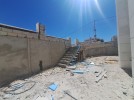 شقة ارضية مع حديقة للبيع في الحمر بمساحة بناء 235م